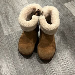 Toddler size 8 uggs. In good condition with lots of life left in them.